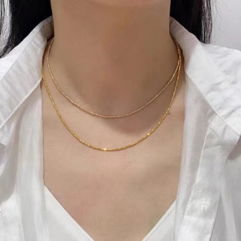 Zeitlose Eleganz – 18K Gold, AU750 mit Zertifikat, Halskette mit Laserperlen und Wellen-Design.