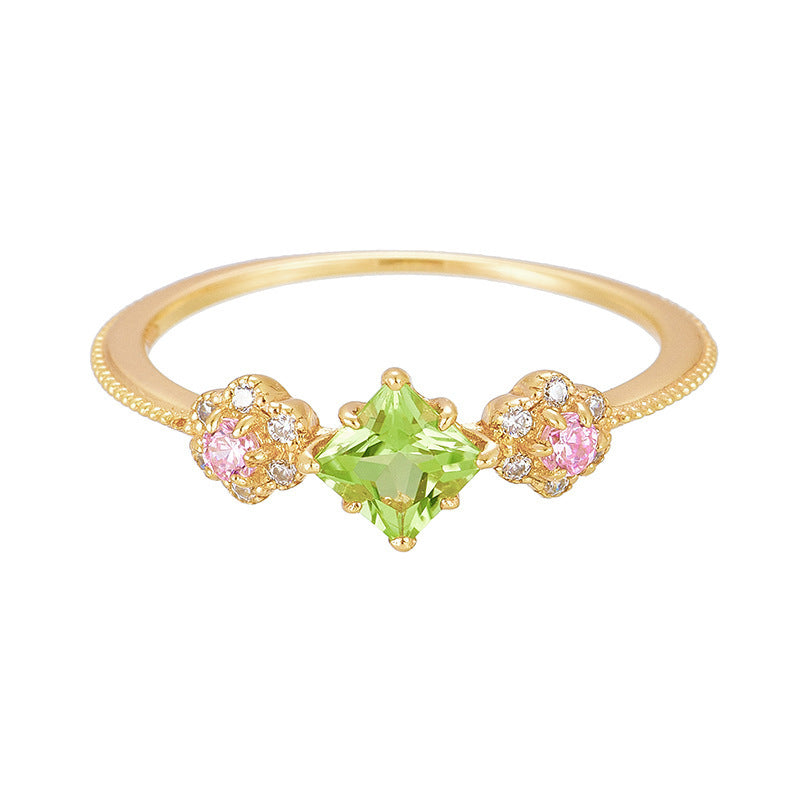 Goldener Blumenring – Leichter Luxus mit Peridot-Akzent